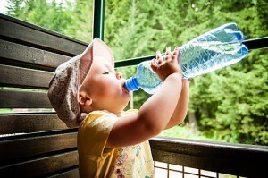 Child drinking bottled water